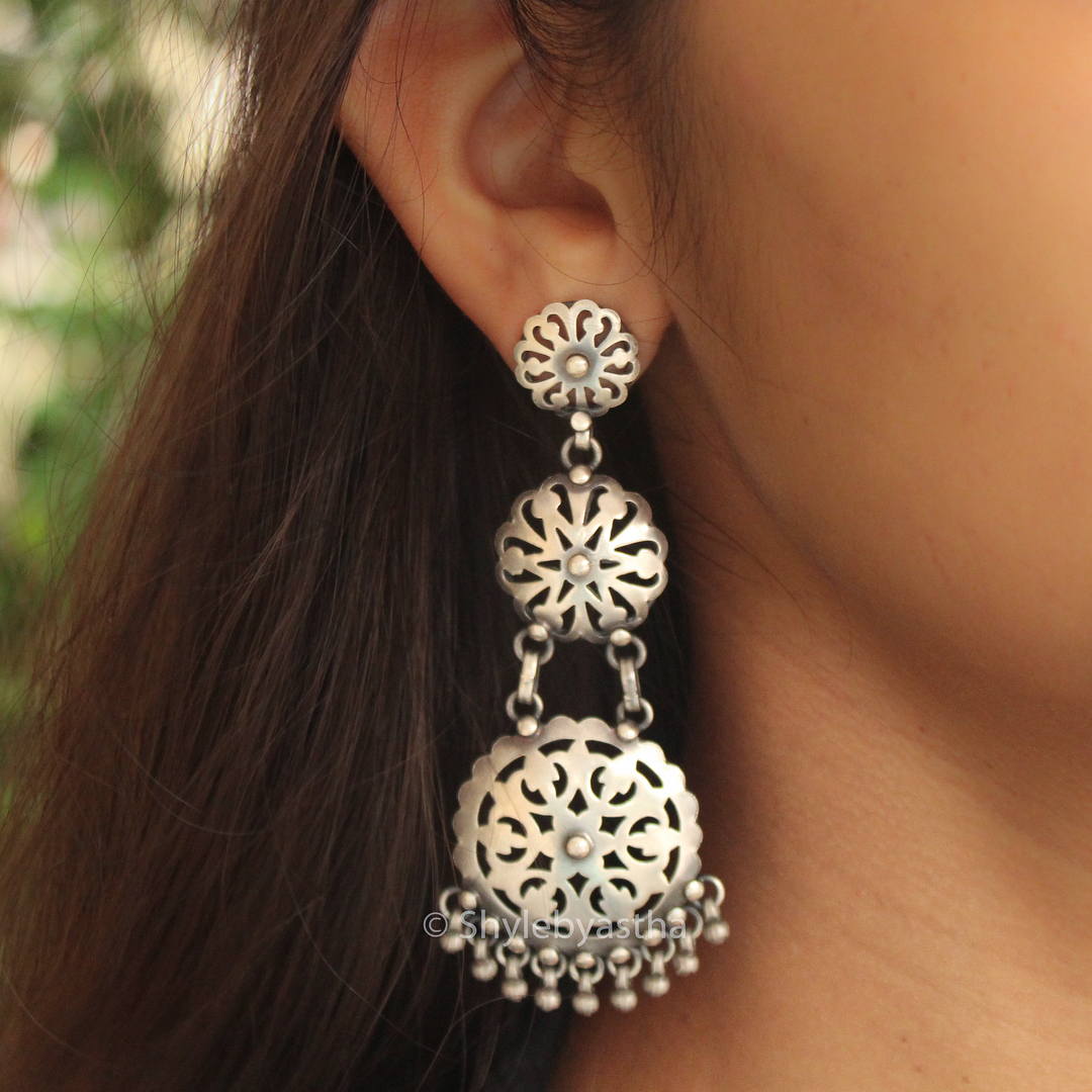 Anvaya Three Layered Carved Danglers