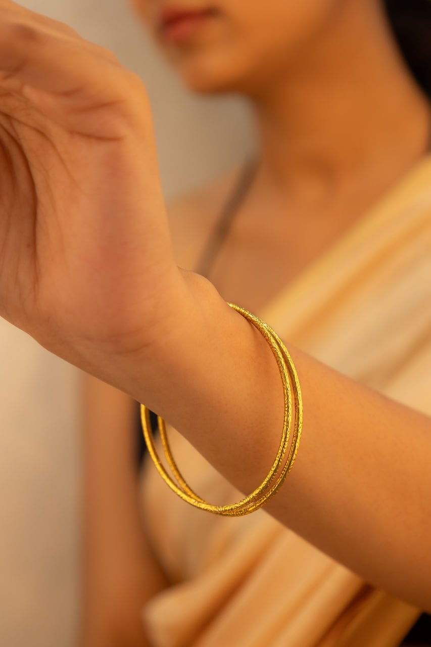 Adya Intricate Gold Plated Bangle