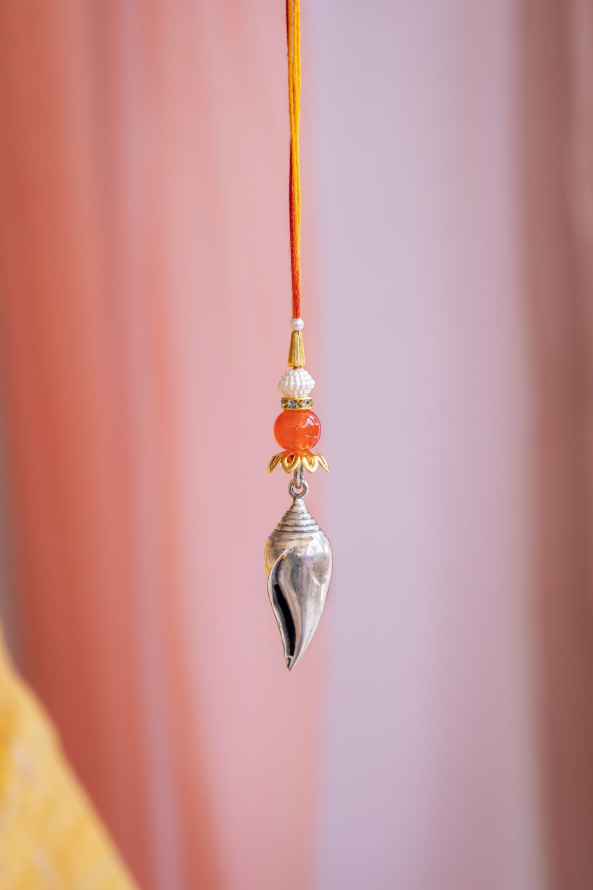 Adya  Shankha Pendant Lumba Rakhi