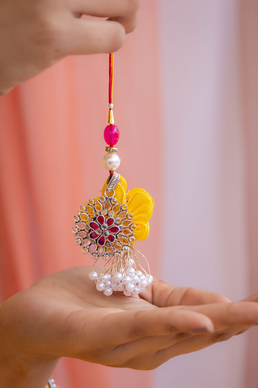 Essence Scintillating Flower Pendant Blooming Lumba Rakhi