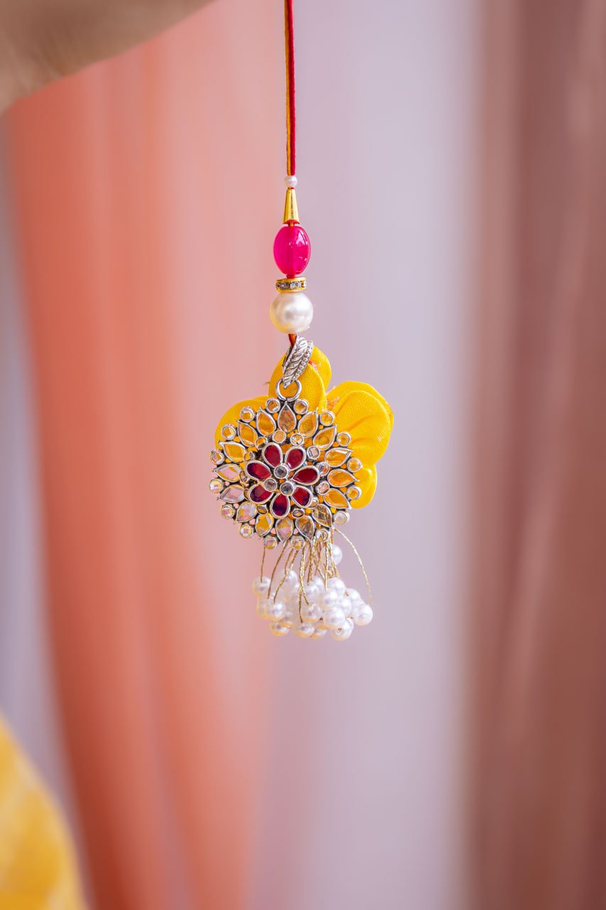 Essence Scintillating Flower Pendant Blooming Lumba Rakhi