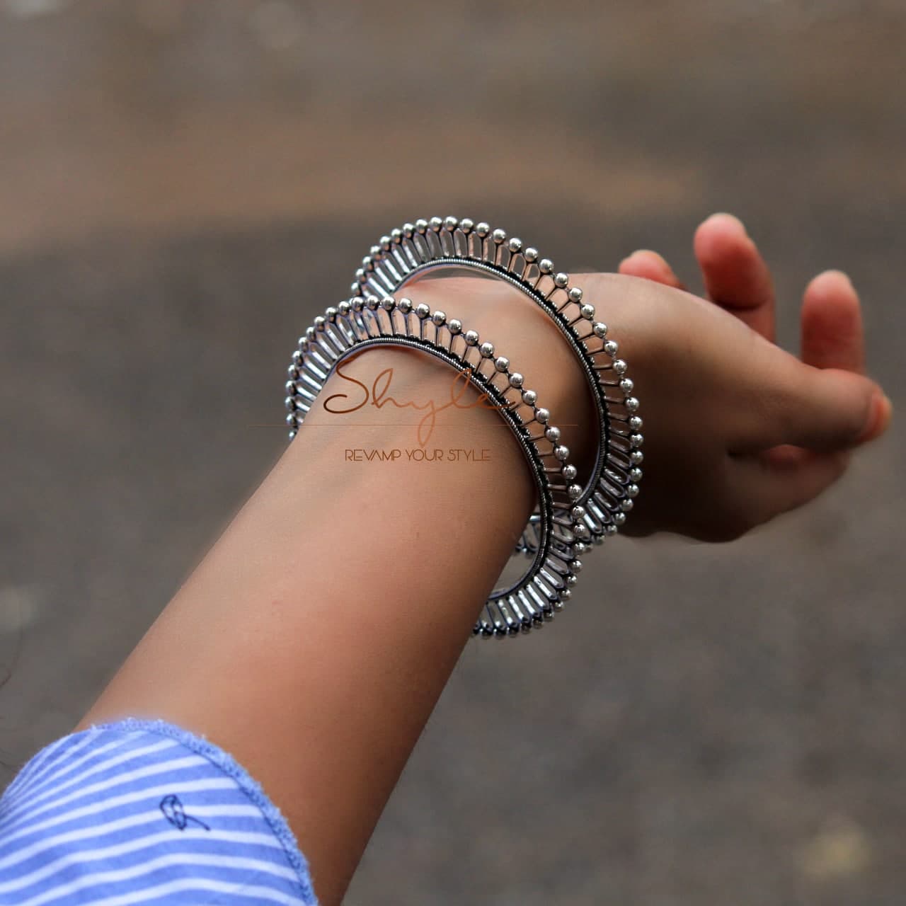 Anvaya Carved Embossed Gokhru Bangle primary