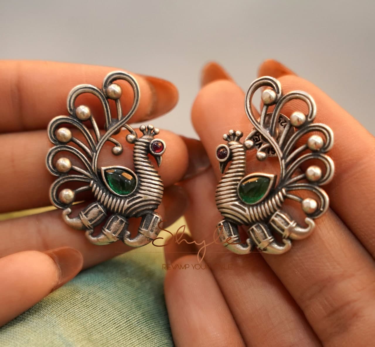 Adya Intricate Dancing Peacock Studs