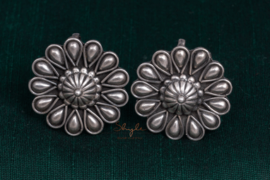 Moh Embossed Flower Studs front